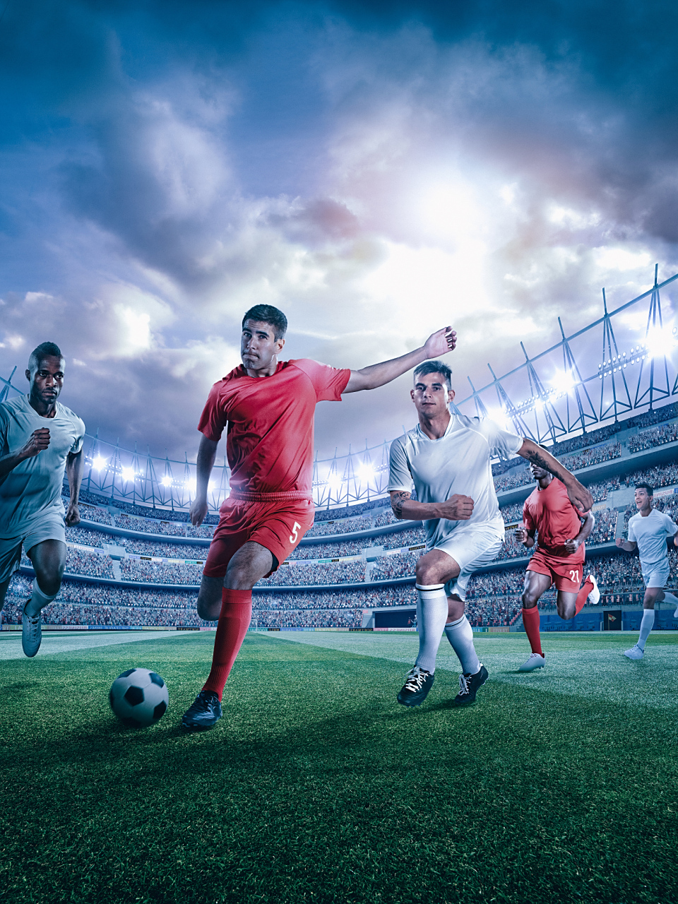 精彩的足球比赛在热火朝天的气氛中进行 精彩的足球比赛在热火朝天的气氛中进行